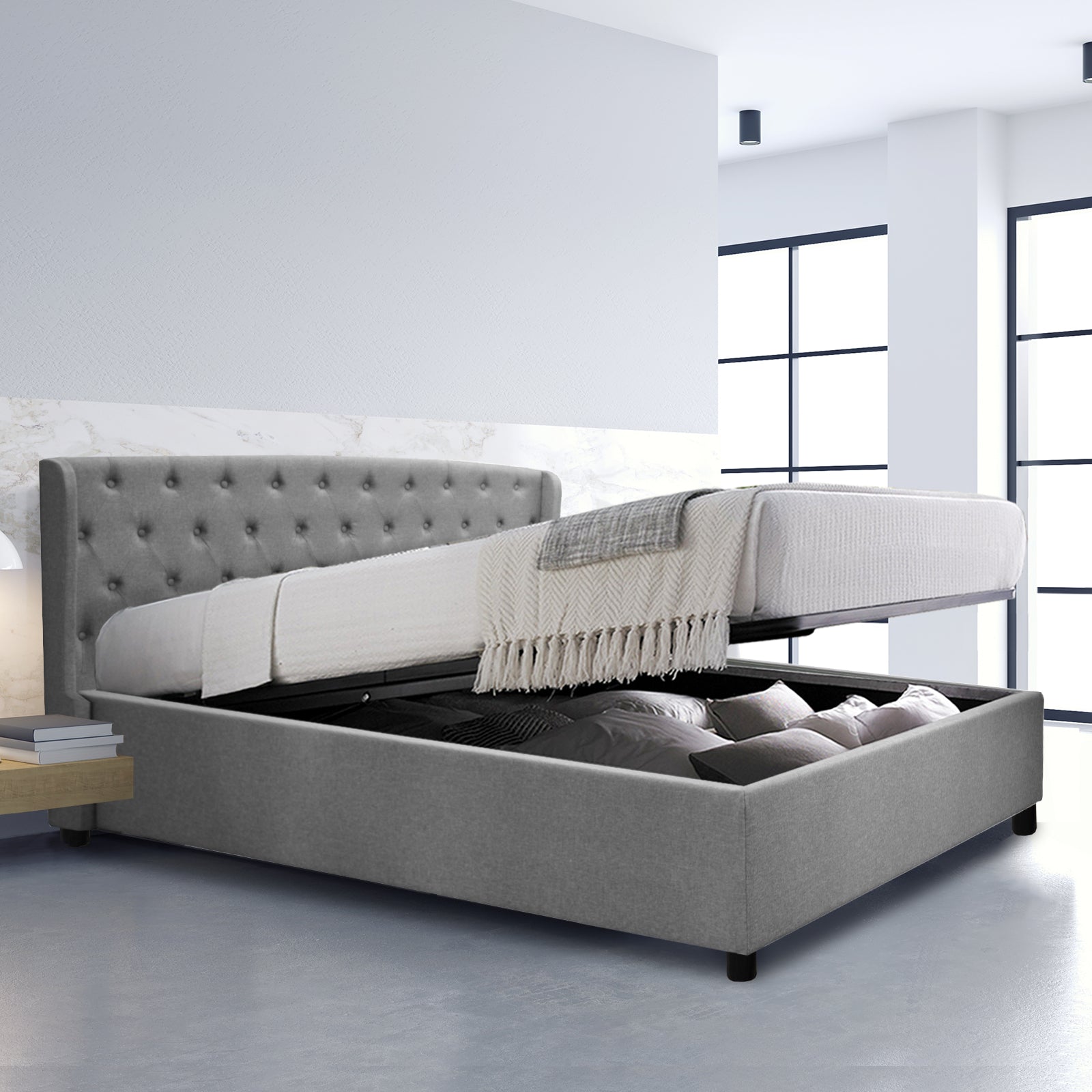 Lit coffre sommier relevable Monceau capitonné chic : tissu et sommier à lattes en bois flexibles